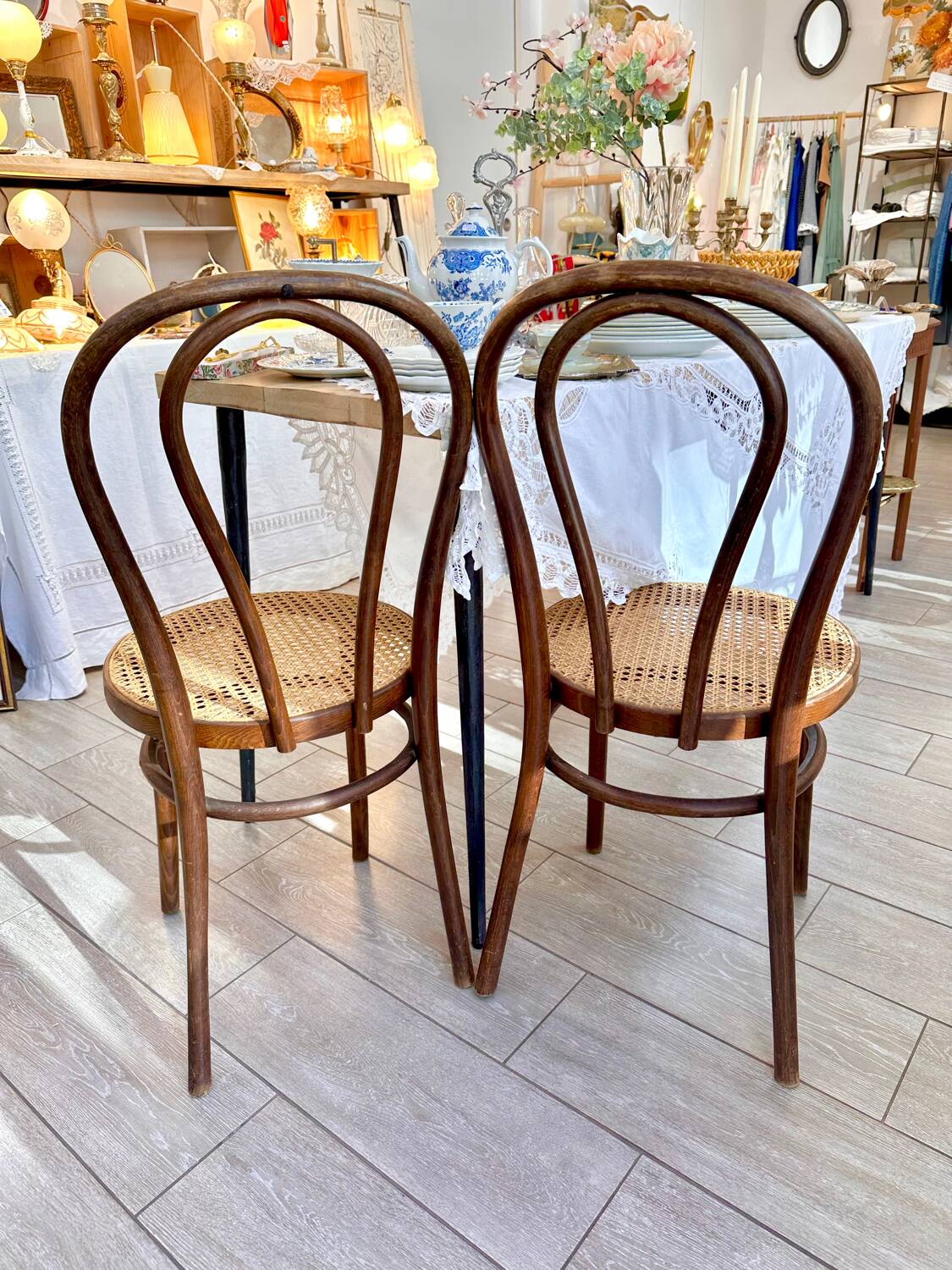 Wooden and cane bistro chairs
