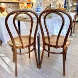 Wooden and cane bistro chairs