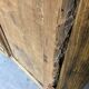 Ancienne porte en bois avec son encadrement