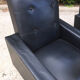 Paire de fauteuils skaï noir, 1960