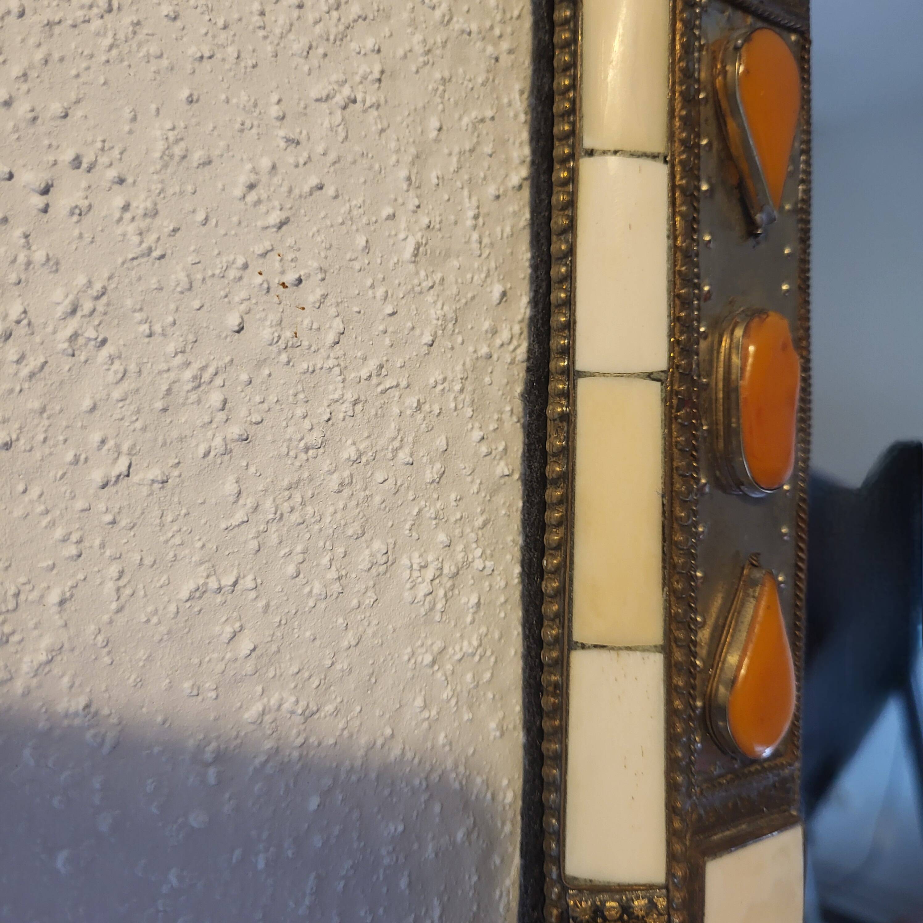 Ethnic bone and stone mirror