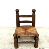 Brutalist chair in wood and straw