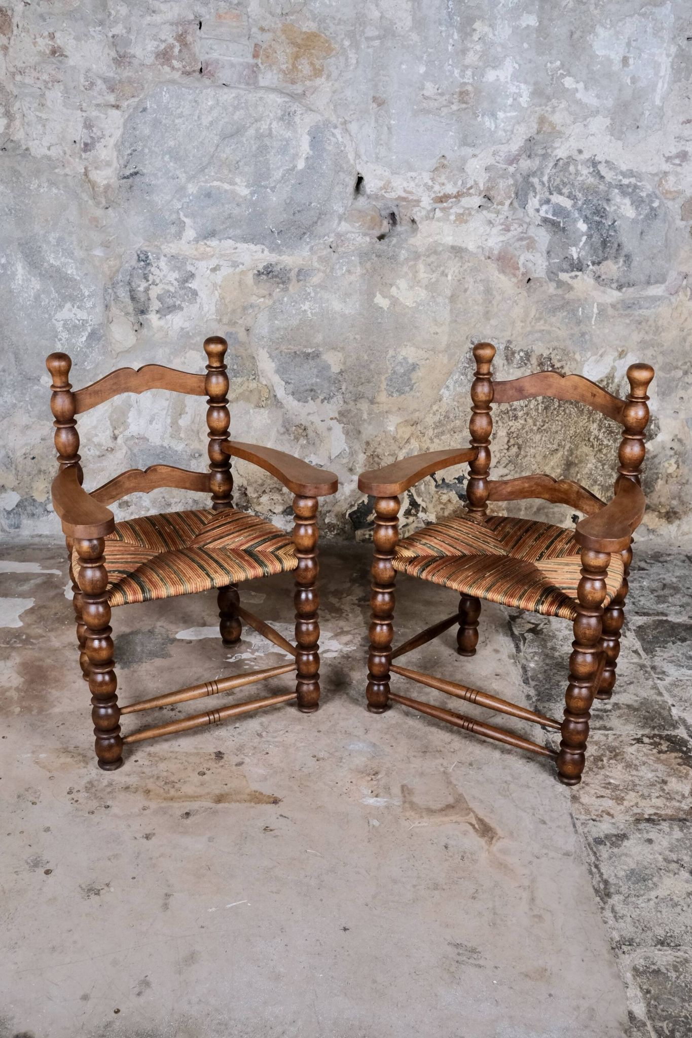 Pair of turned wooden spool armchairs, mid-20th century, France