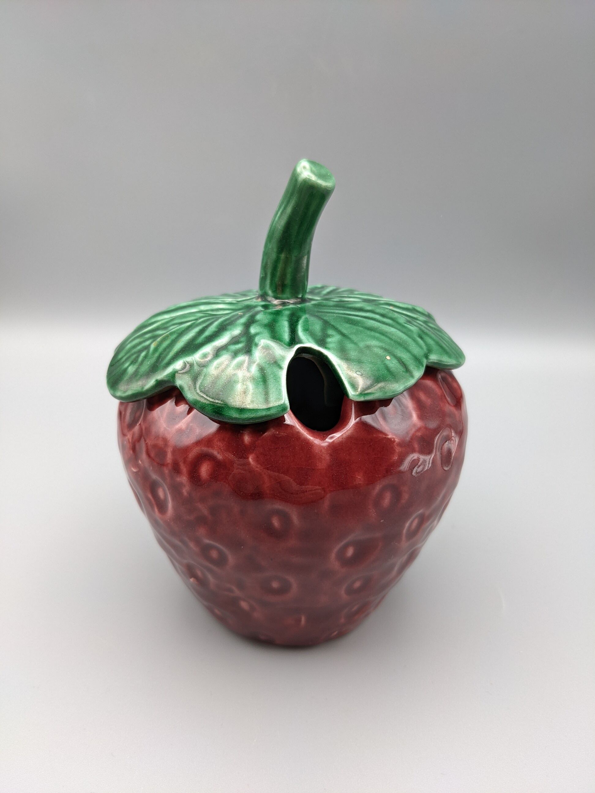 Condiment jar mustard jam in the shape of strawberry