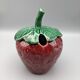 Condiment jar mustard jam in the shape of strawberry