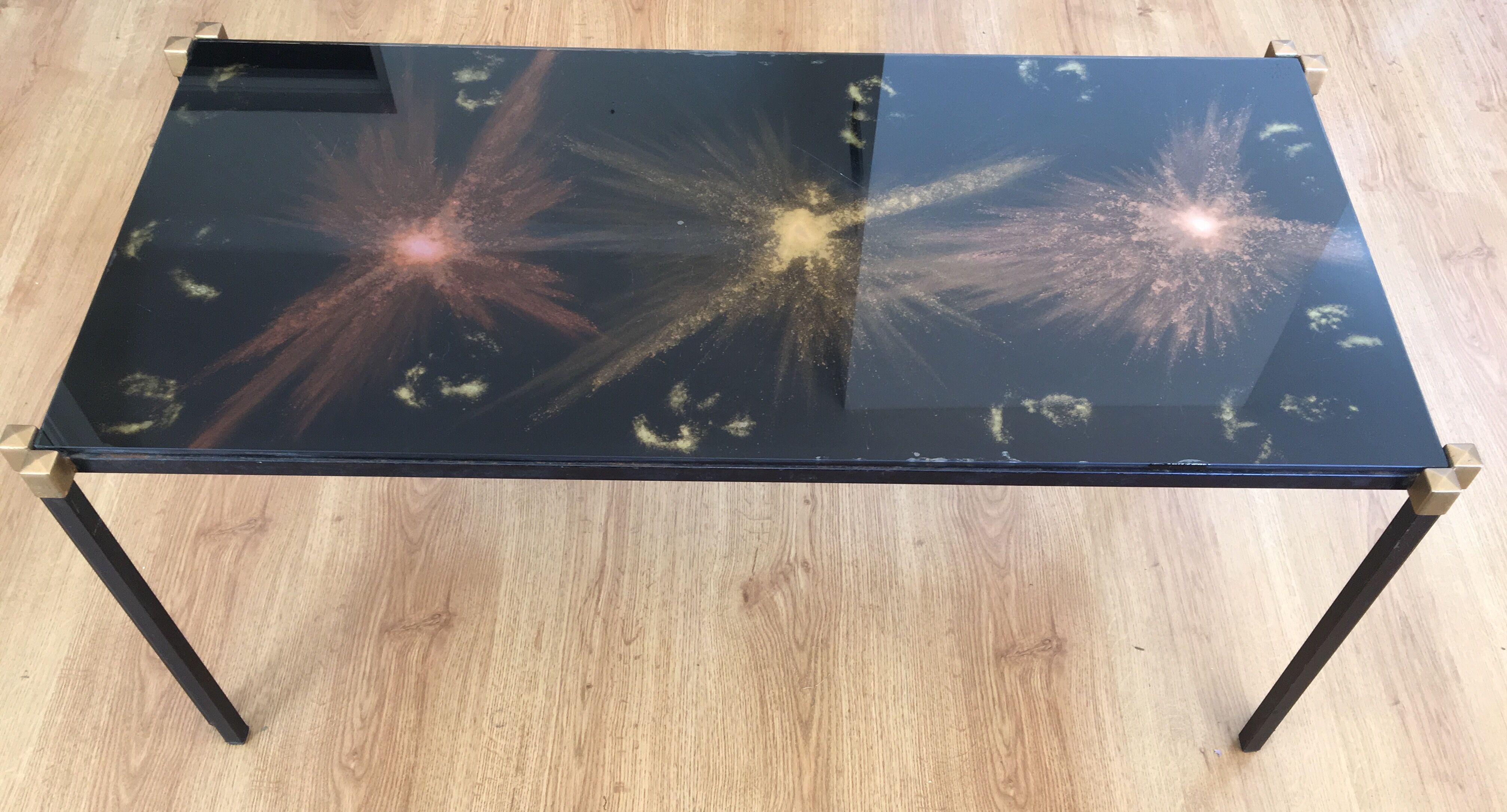 Glass coffee table by Lasco eglomisé and iron/iron gold. signed