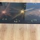 Glass coffee table by Lasco eglomisé and iron/iron gold. signed