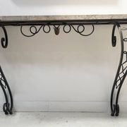 Art Deco console in hammered wrought iron, 20th century.