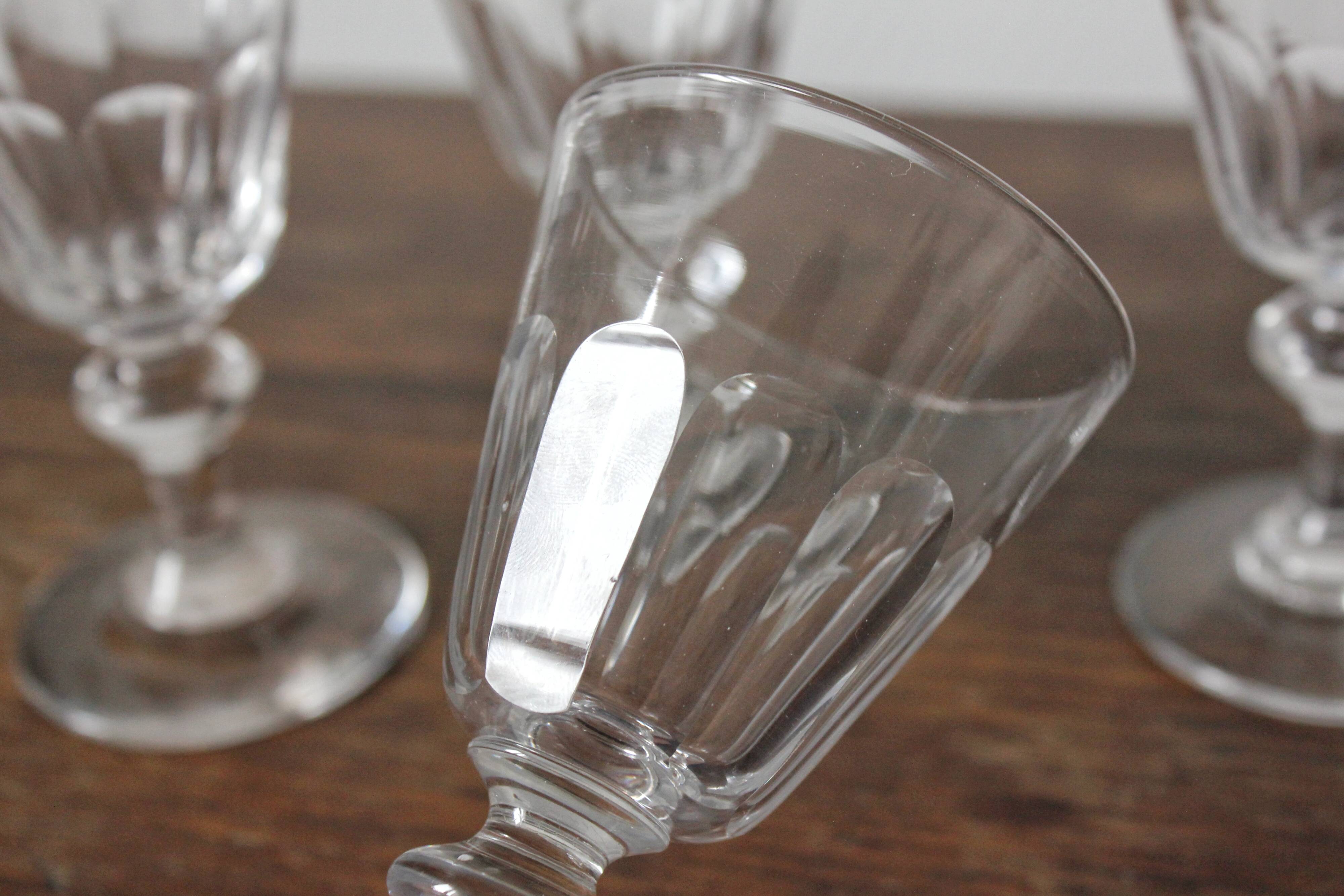 4 glasses with white wine in crystal ringing the nineteenth