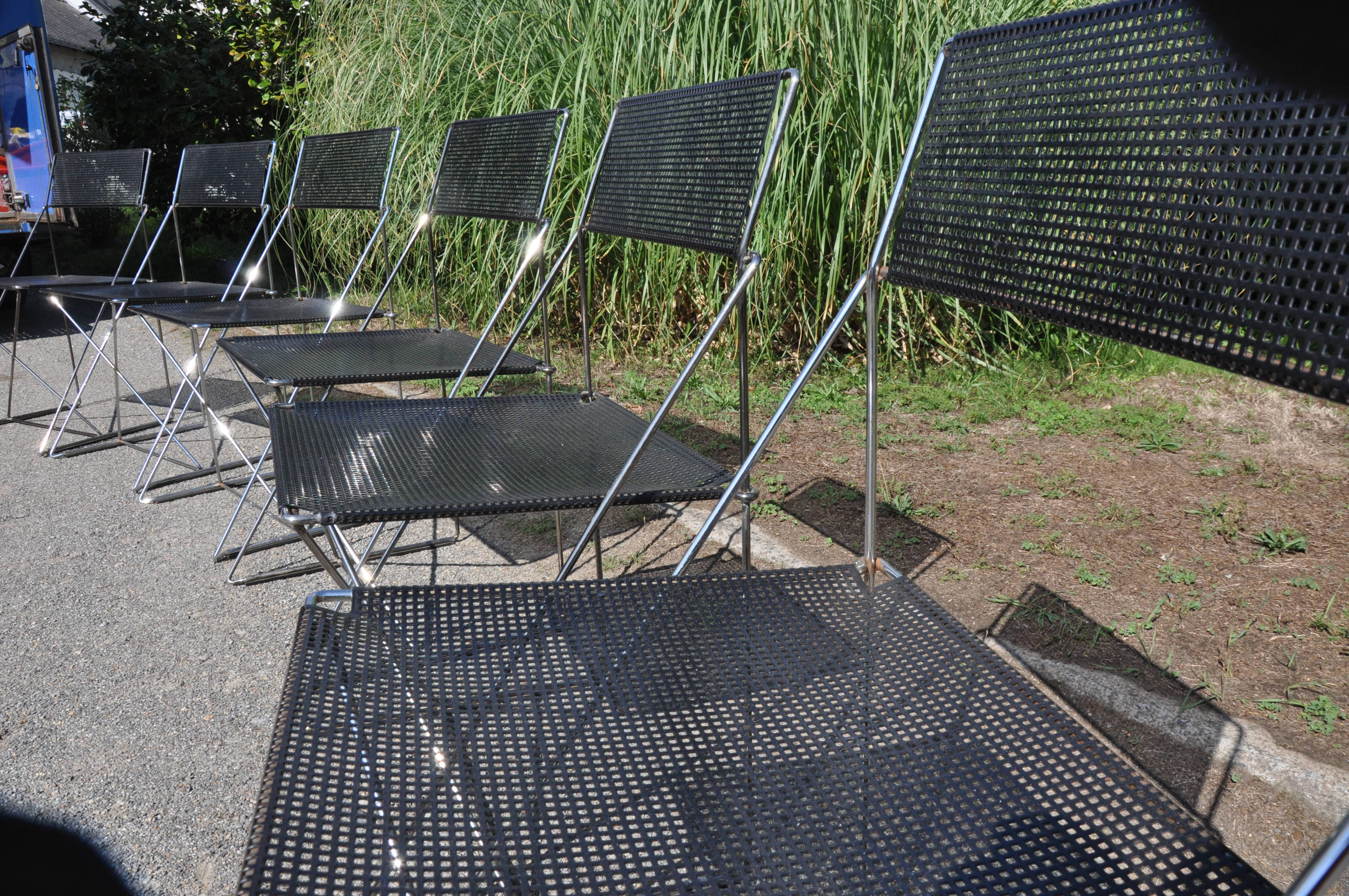 Nuova x line omli chairs by Niels Jørgen Haugesen