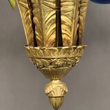 Solid bronze Art Deco style chandelier with iconic handmade lampshades.