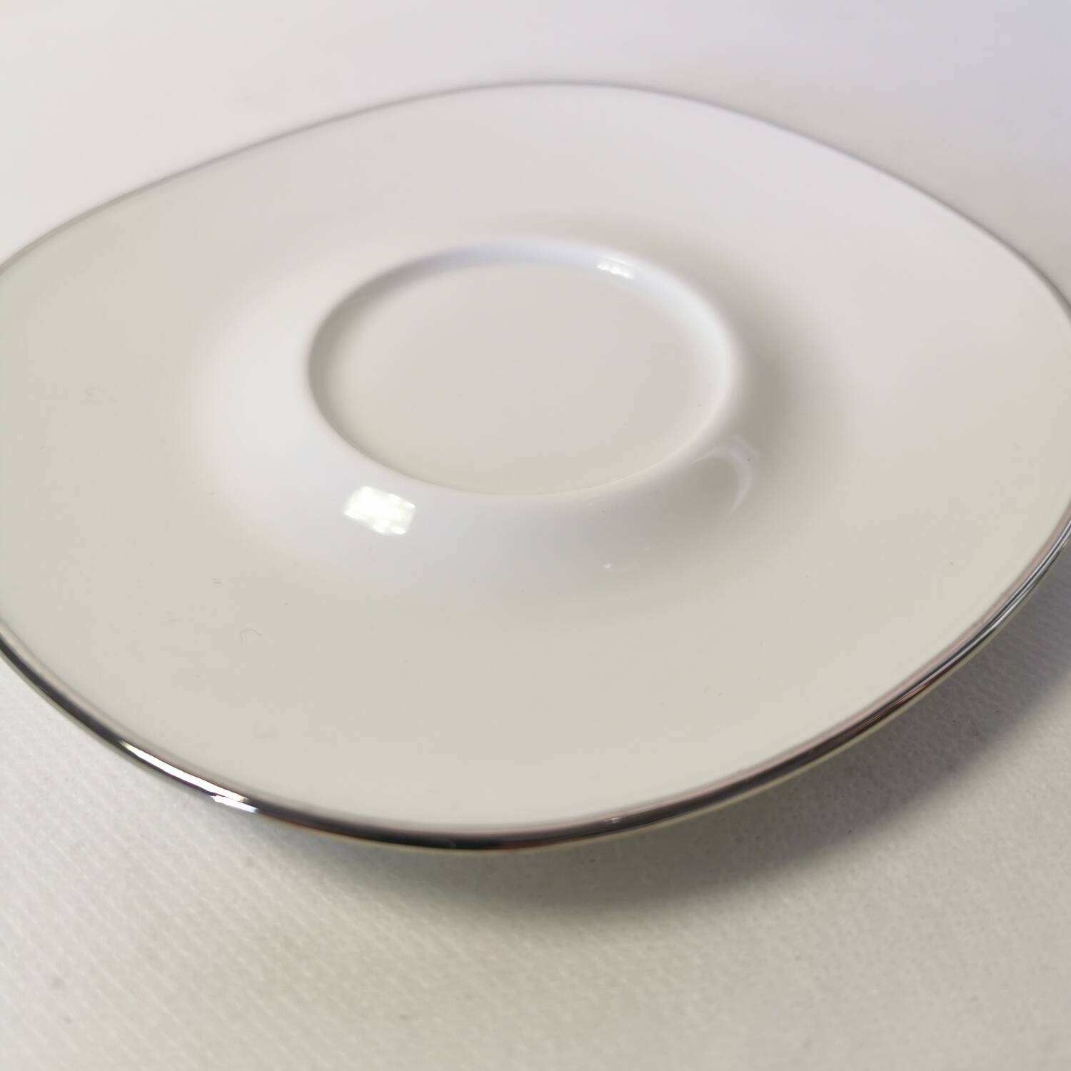 Set of 8 Georges Boyer Limoges porcelain saucers