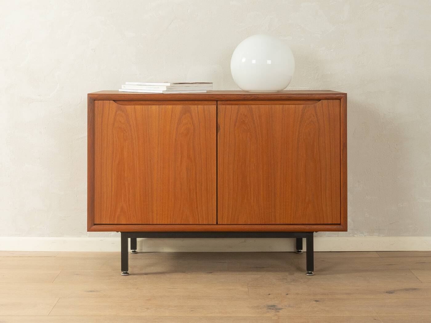 Classic chest of drawers from the 1960s with practical, closed storage space