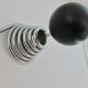 "Streamline" wall coat rack in chromed metal and black lacquered wood, 1970.