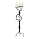 Large wrought iron candelabrum with an abstract design and three candle holders.