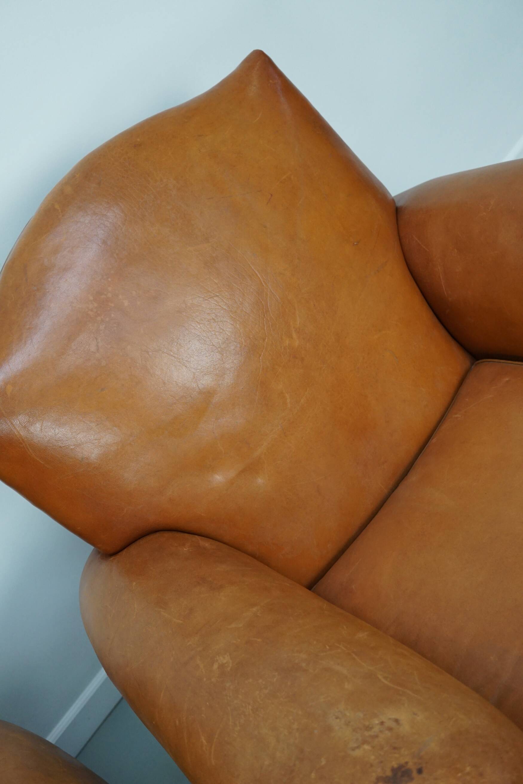 Pair of French club chairs with moustache back in cognac leather, 1950s