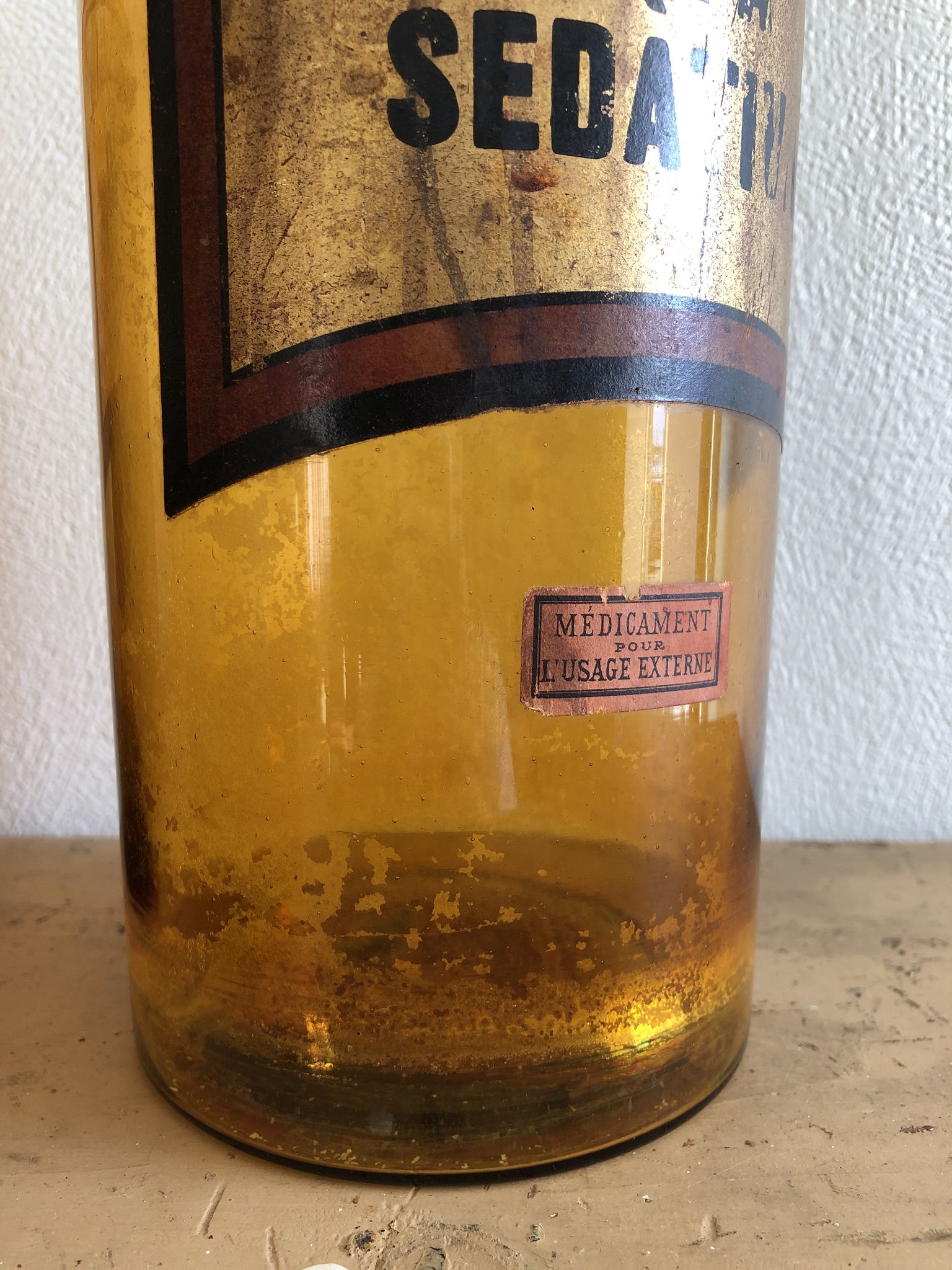 Old bottle of pharmacy "aqua sedativa" brown glass