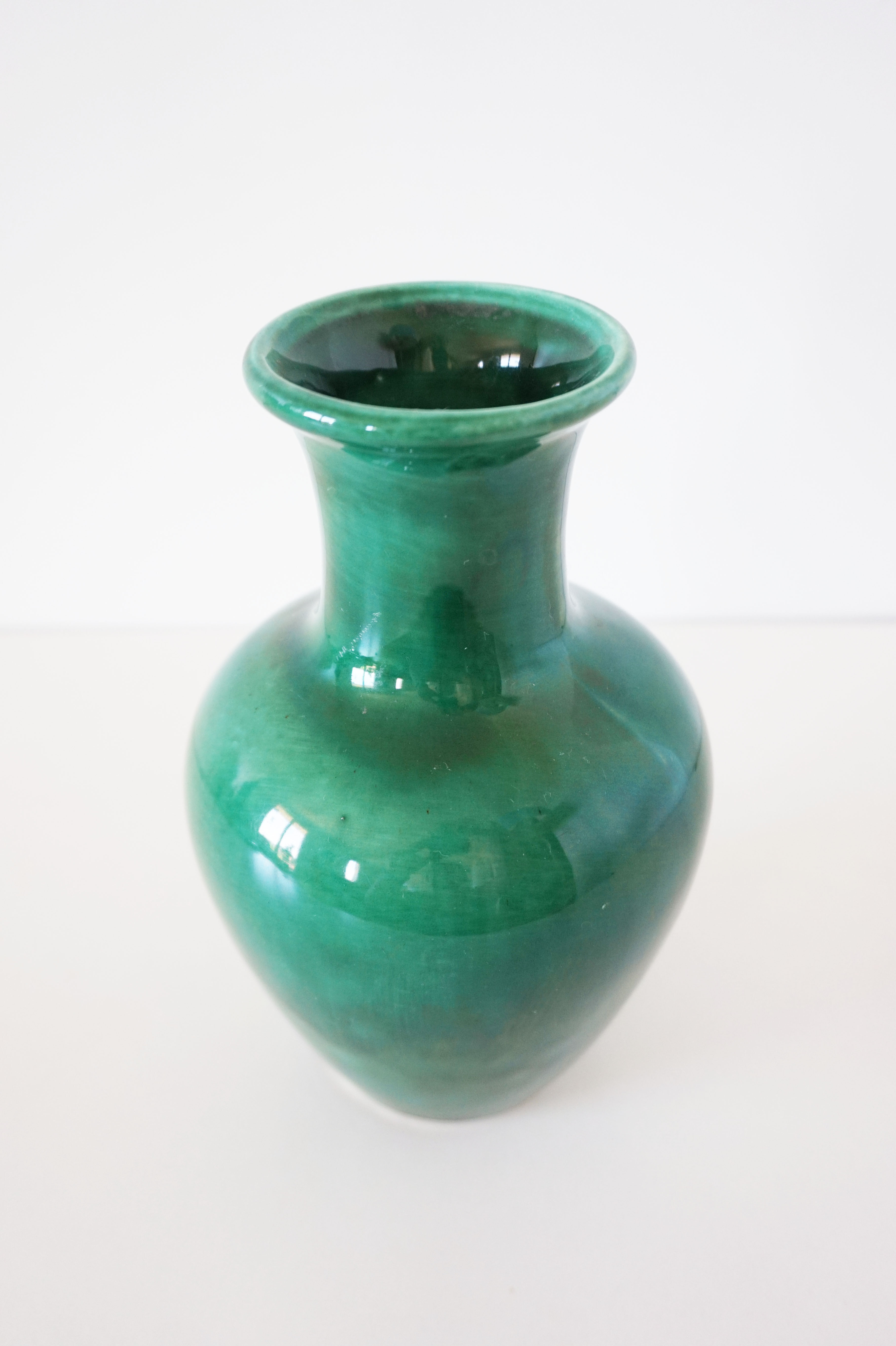 Green iridescent ceramic vase