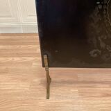 Antique metal fireplace screen.