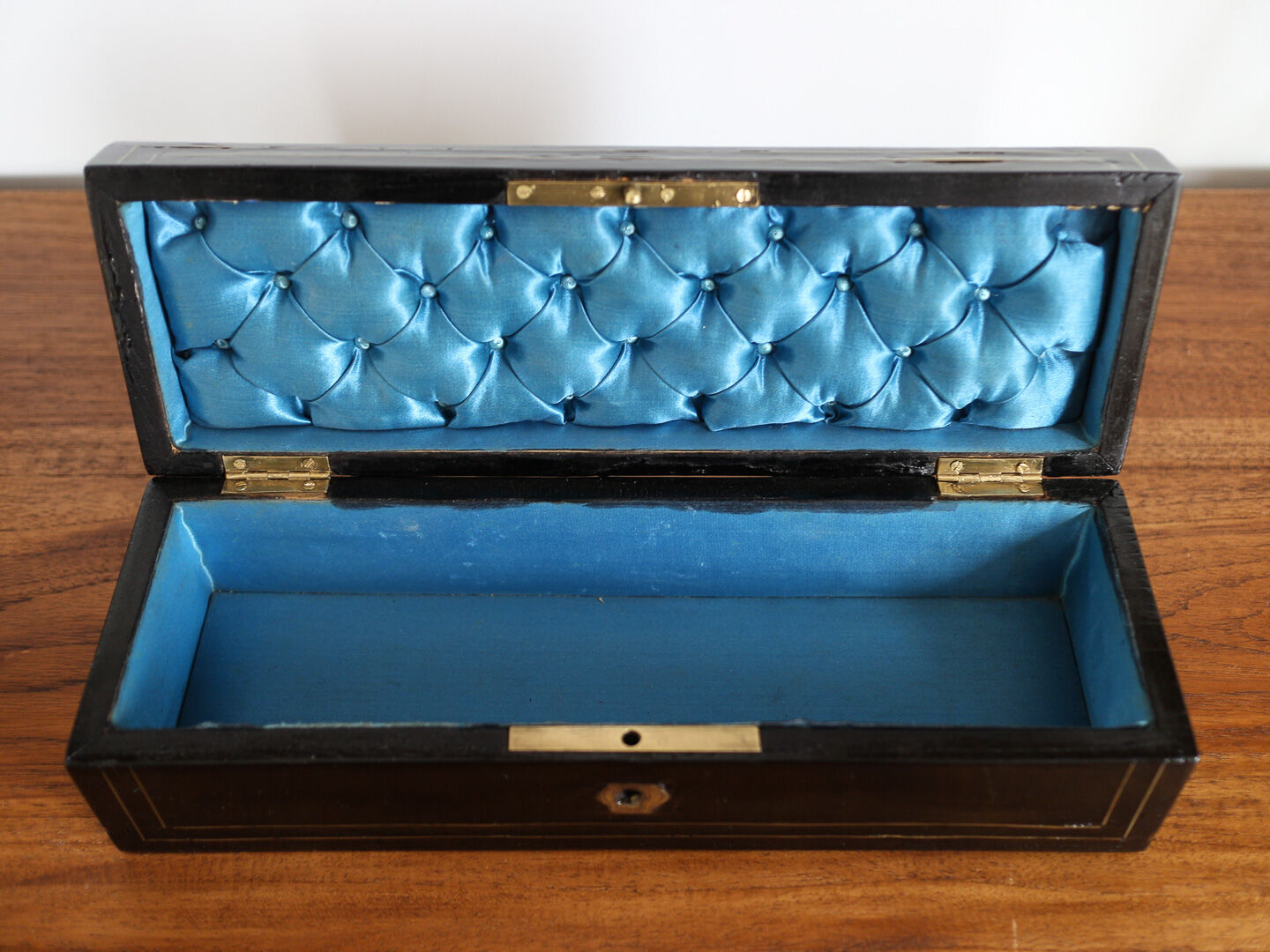 Glove box in ball marquetry