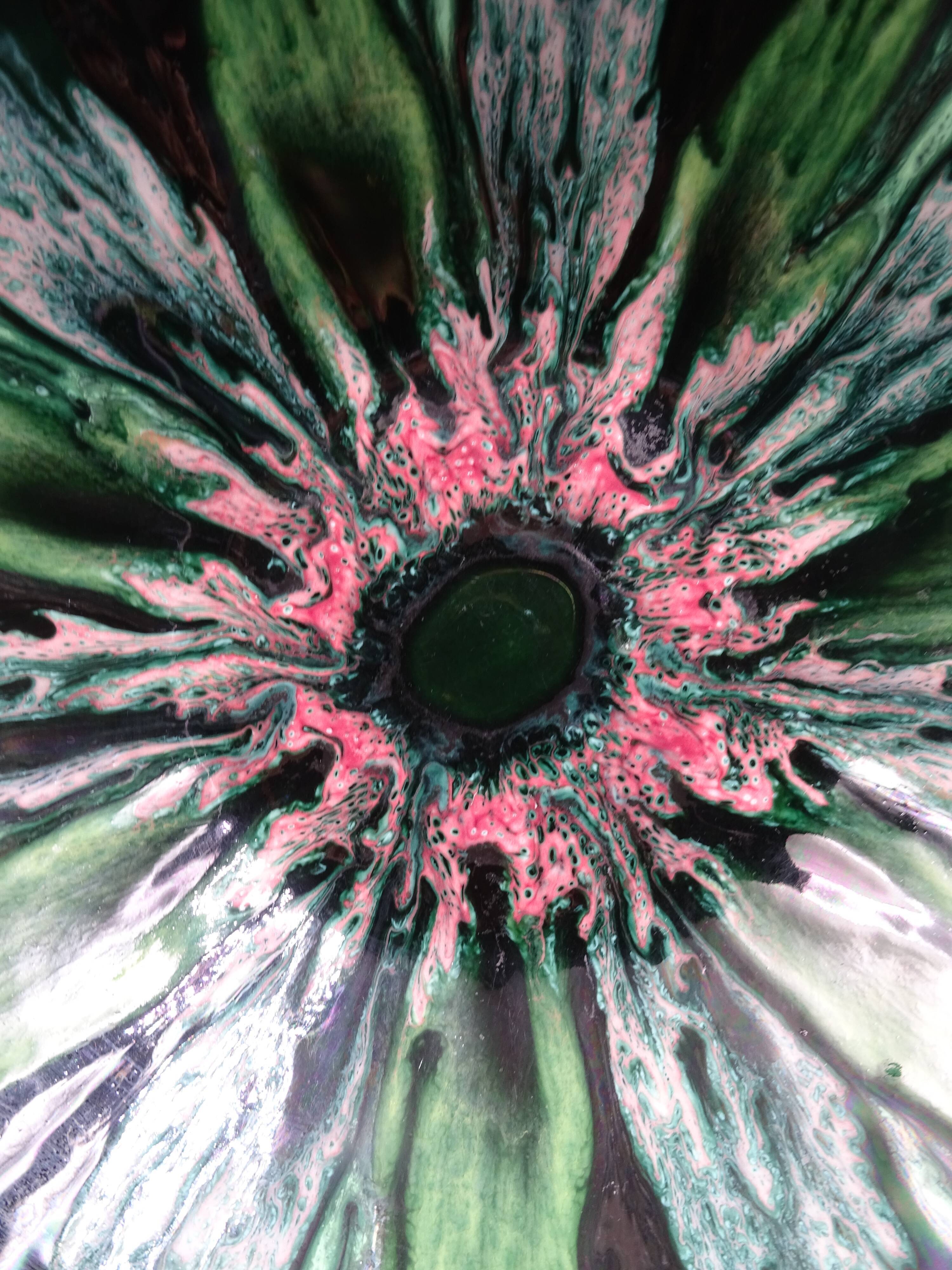 Green faience bowl decorated with multicolored drips around 1970