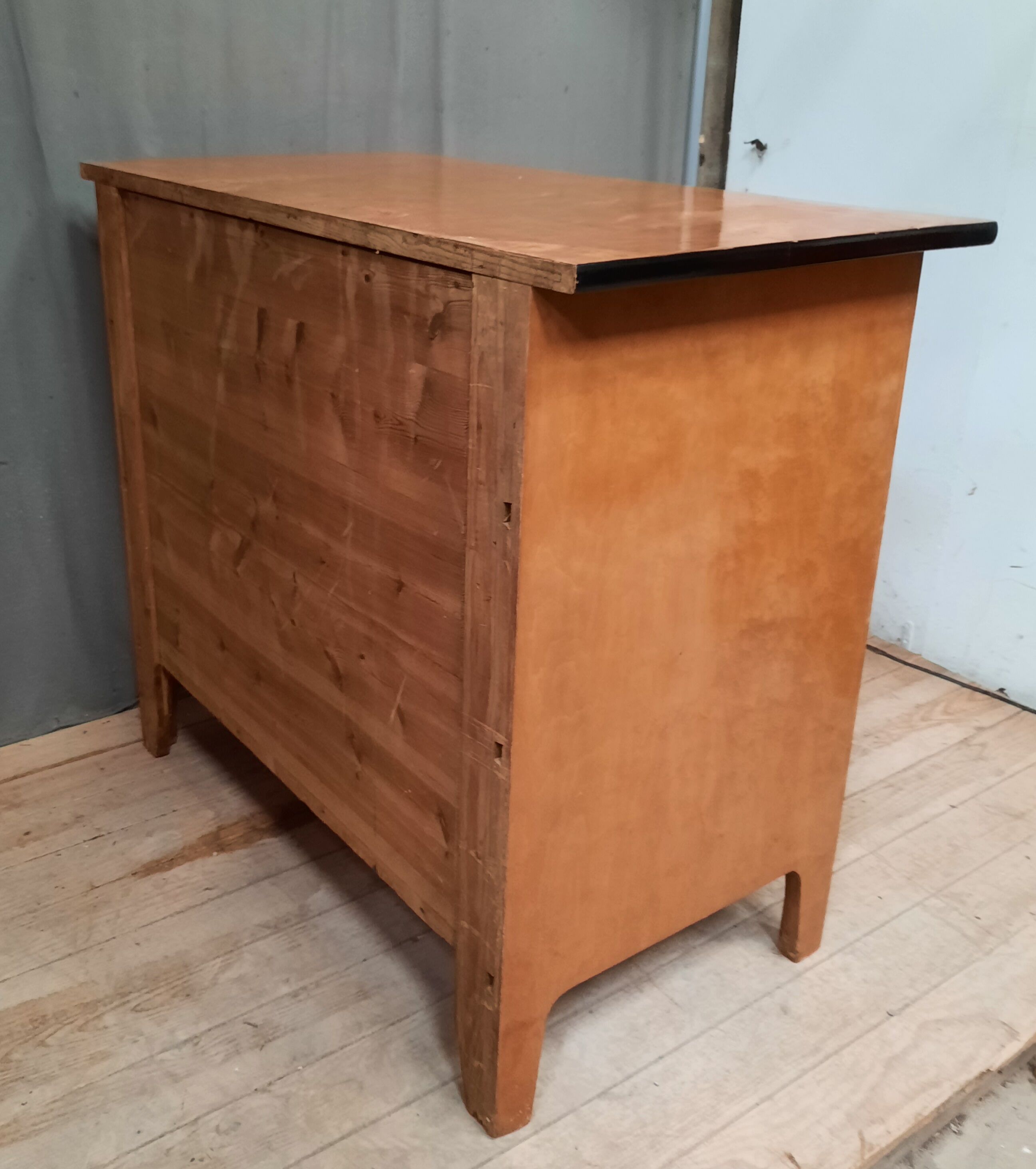 Yellow wooden chest of drawers
