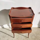 Three-drawer cherry bedside table