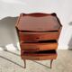 Three-drawer cherry bedside table