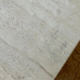 Square coffee table in travertine.