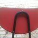 Lot of 6 red chairs in faux leather metal compass feet