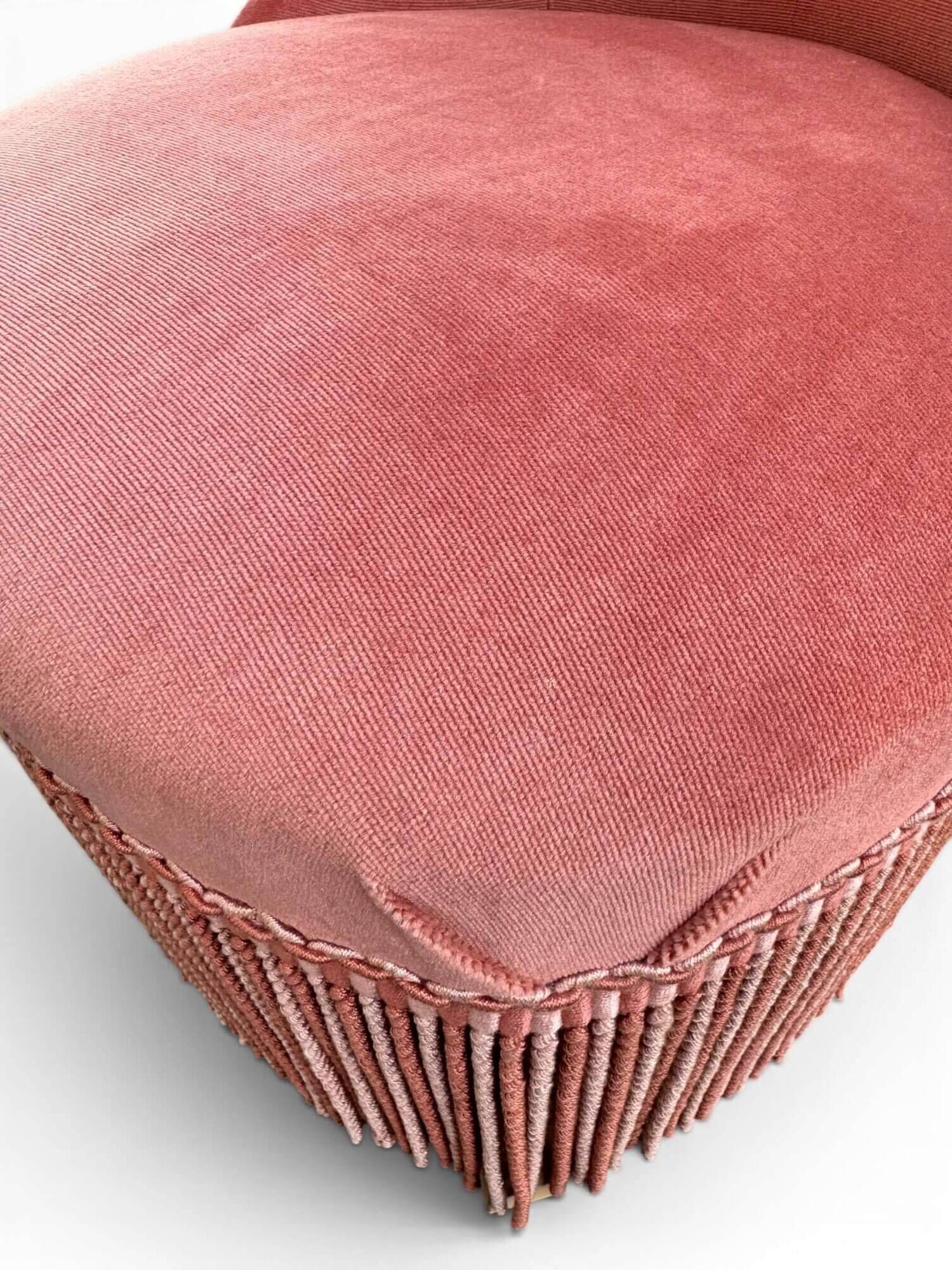 Vintage pink velvet fringed armchair