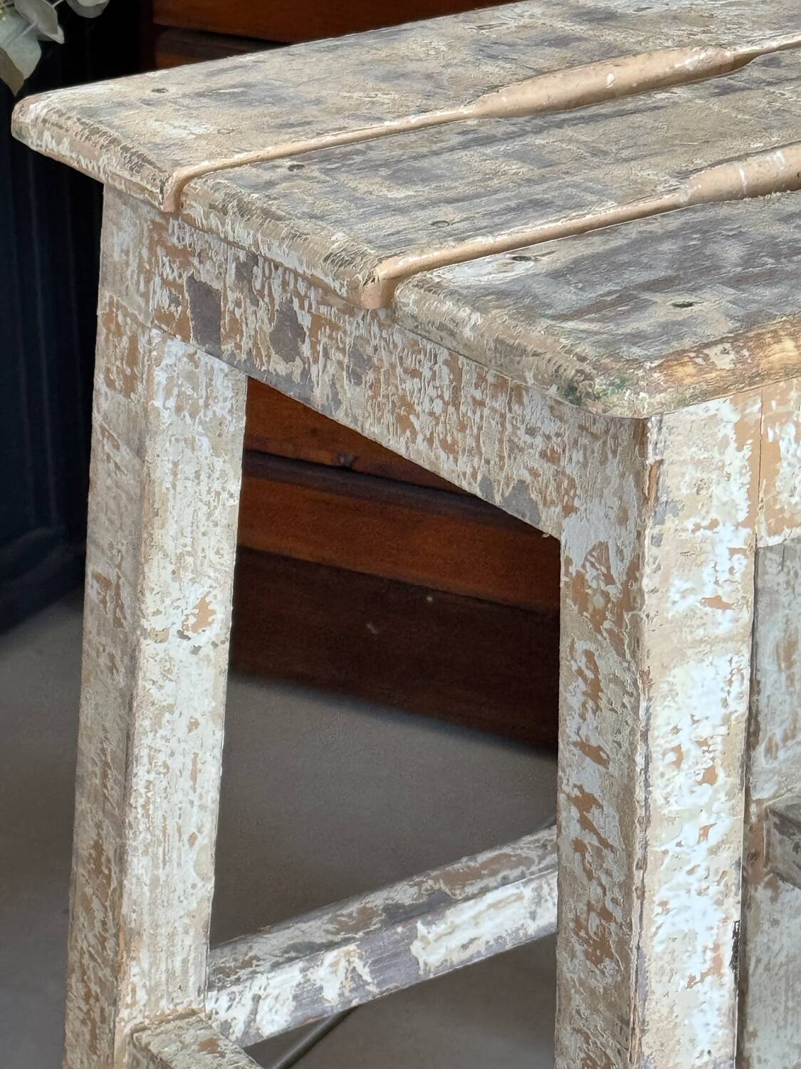 Old wooden stool with square seat