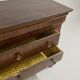 Commode de style Empire en placage de bois flammé
