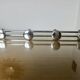 Wall coat rack with 4 hooks in chrome metal 1970