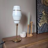 Mid-century gold metal table lamp with white striped shade