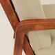 Vintage armchair in olive corduroy with a wooden frame.