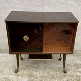 Vintage display bar cabinet on wheels from the 60s/70s.