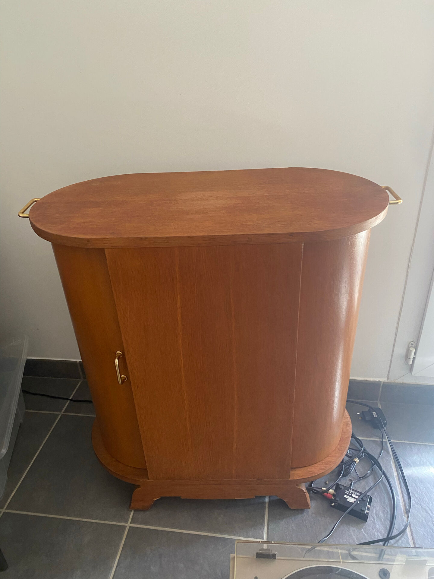 Rotating wooden bar cart from the 1950s.