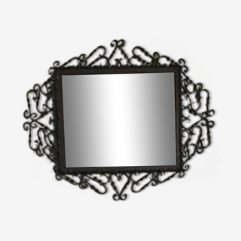 Black wrought iron mirror and gold touches