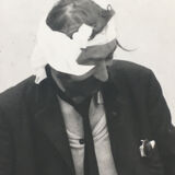 90s photo print: wounded man