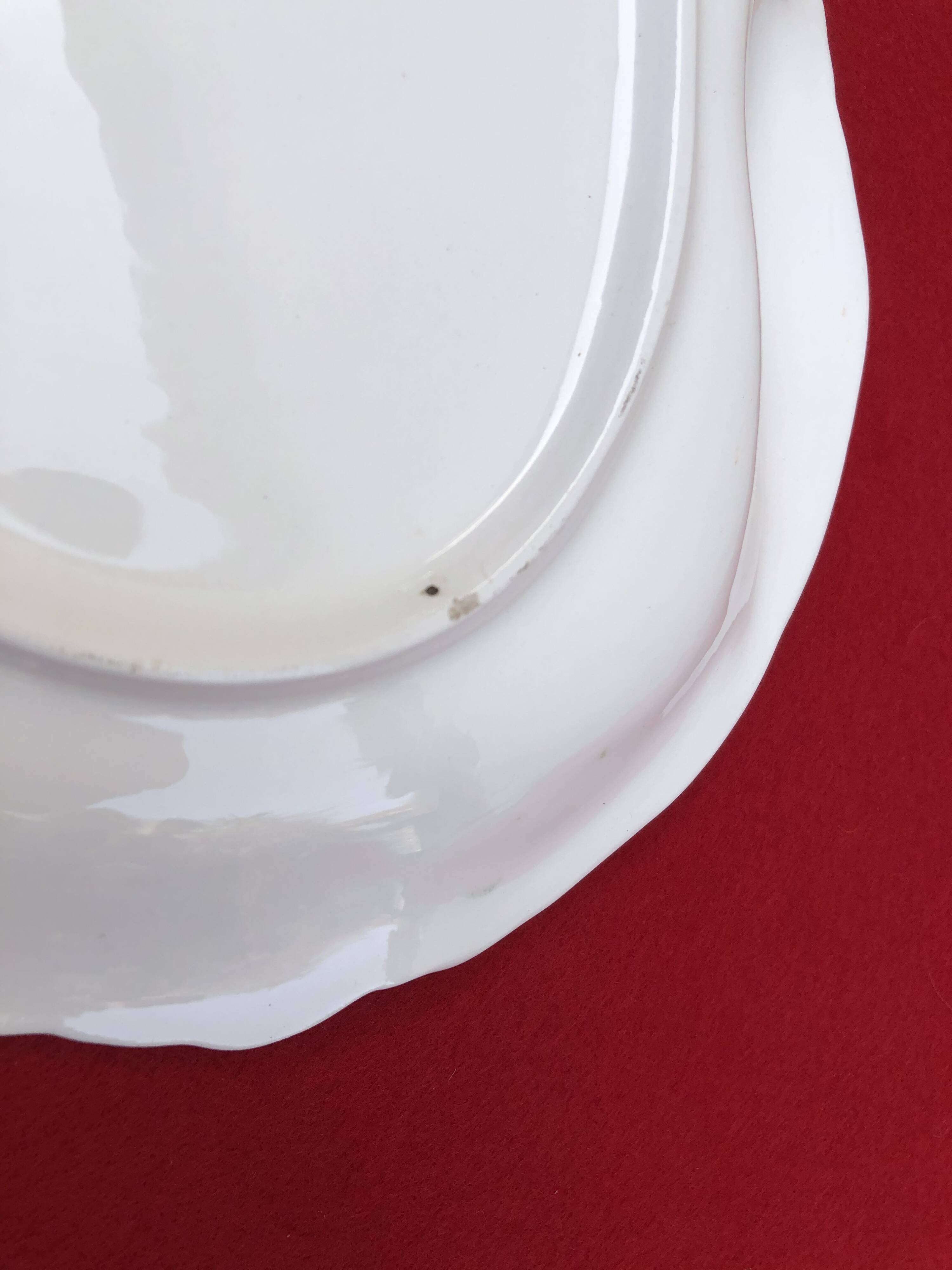 Lancel Paris ceramic dish with embossed parrot decoration