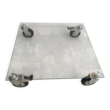 Beautiful designer glass coffee table on wheels
