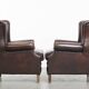 Comfortable and very beautiful set of 2 cow leather wingback armchairs in English style