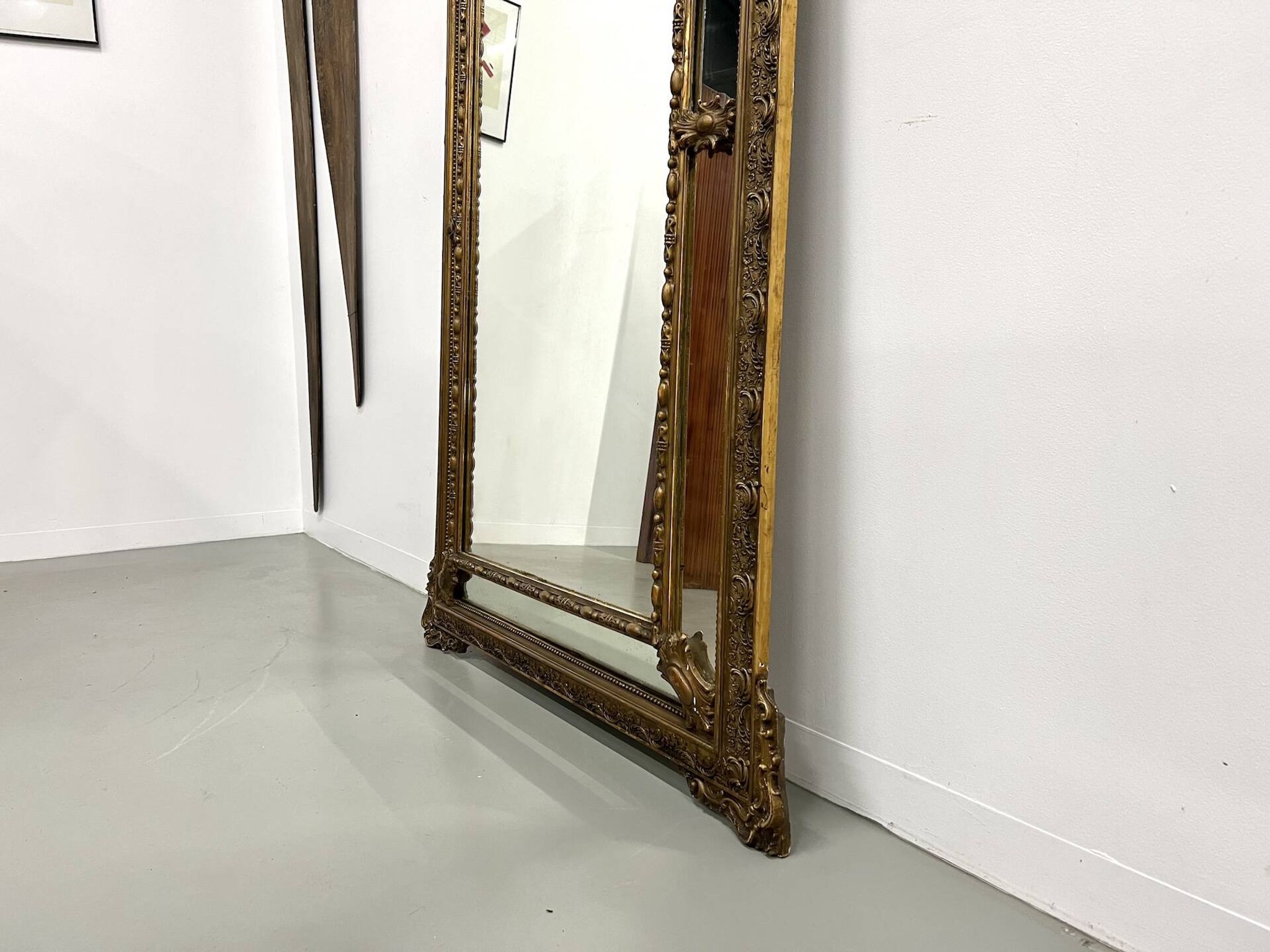 Large antique pediment mirror with mouldings.