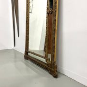 Large antique pediment mirror with mouldings.