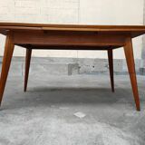 Dining table with oak compass legs