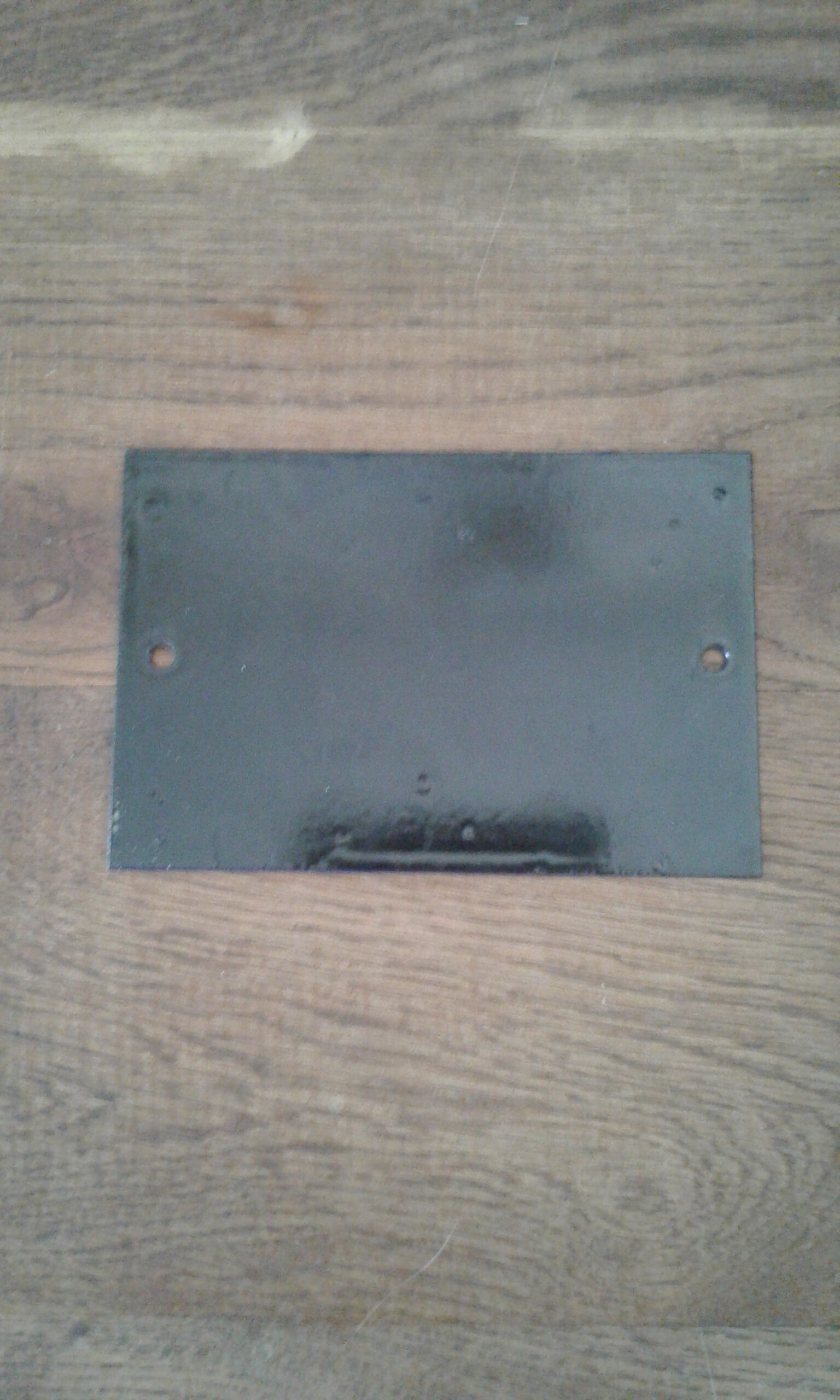 Enamelled street sign bears the number 6