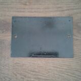 Enamelled street sign bears the number 6
