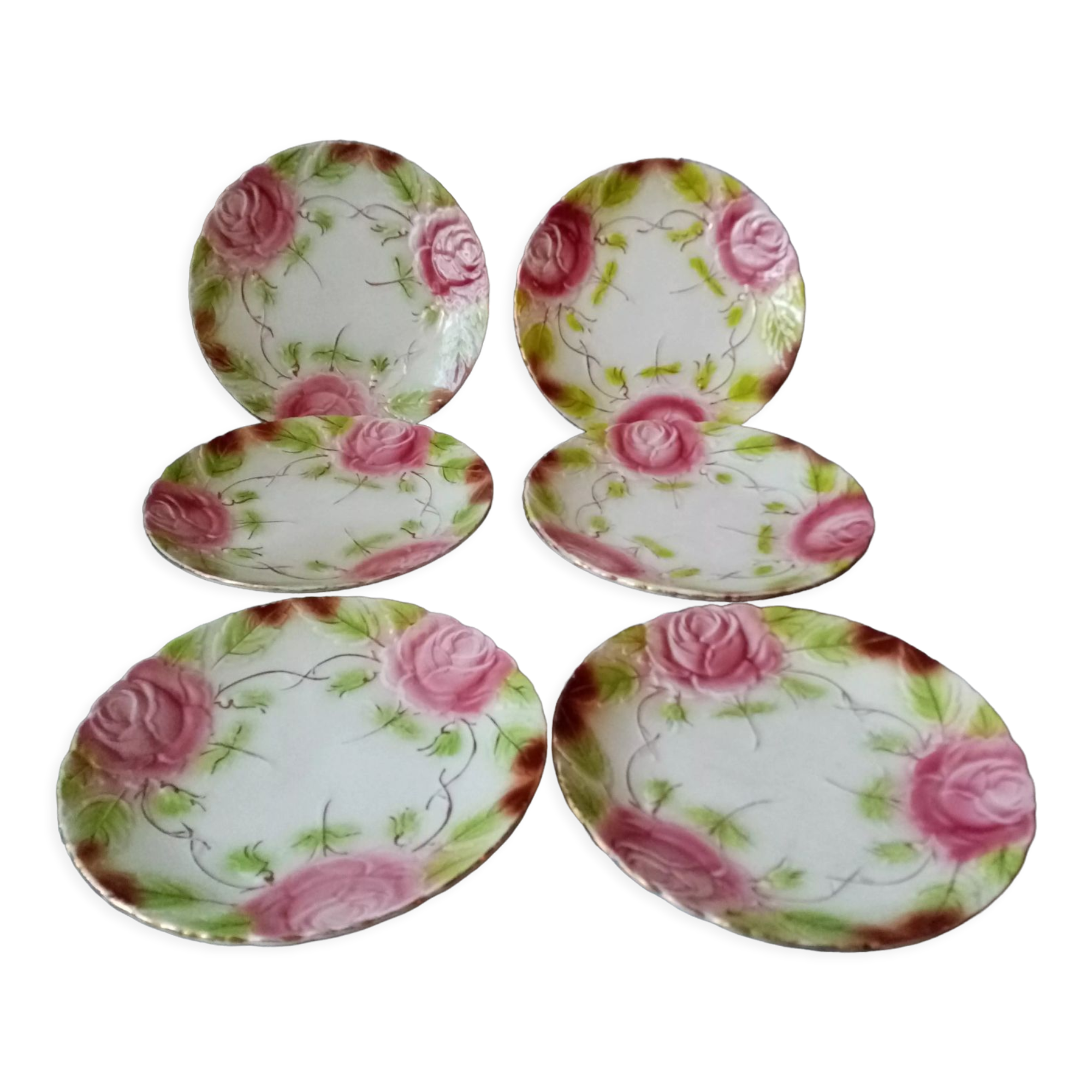 Series of 6 plates in slip decorated with roses