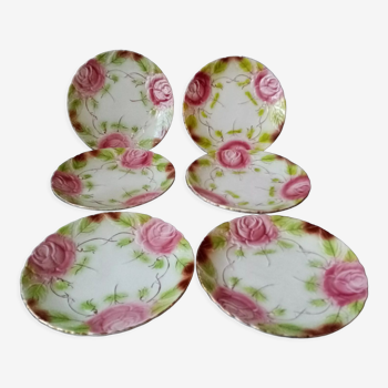 Series of 6 plates in slip decorated with roses